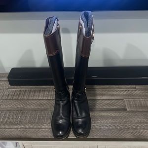 Michael Kors riding boots.